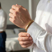 Thumbnail for Man wearing Infinity Bond Matching Bracelet by Brother & Sisters, showcasing its beautiful twisted design.