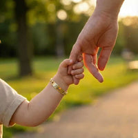 Thumbnail for Infant Bracelet by Brother & Sisters, featuring personalized baby name, charm, and elegance in a heartfelt moment.