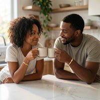 Thumbnail for Couple wearing Infinity Bond Matching Bracelets, sharing coffee moments together in a cozy kitchen.