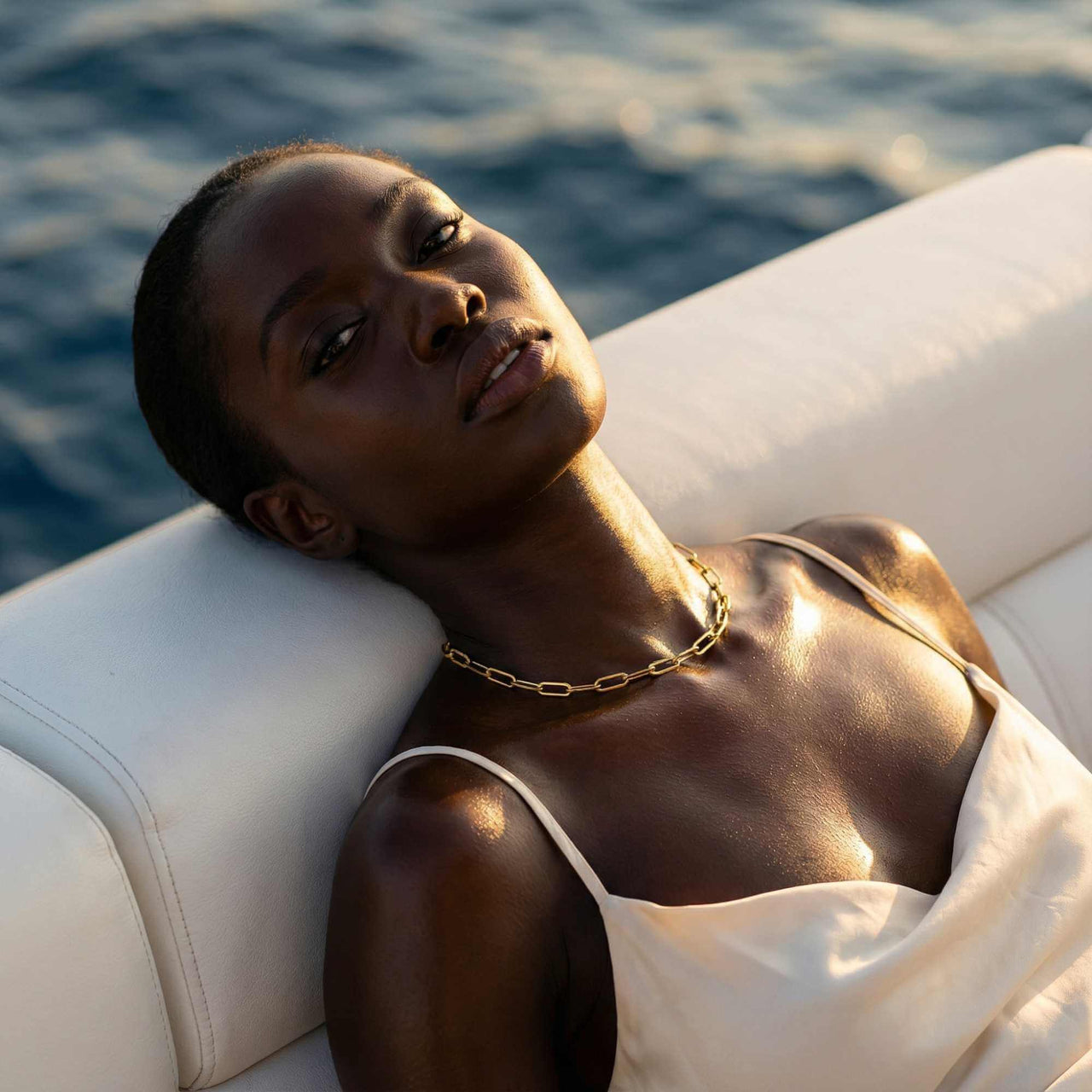 Model showcasing the Ria Paperclip Chain Necklace by Brother & Sisters, featuring bold links and a chic design.