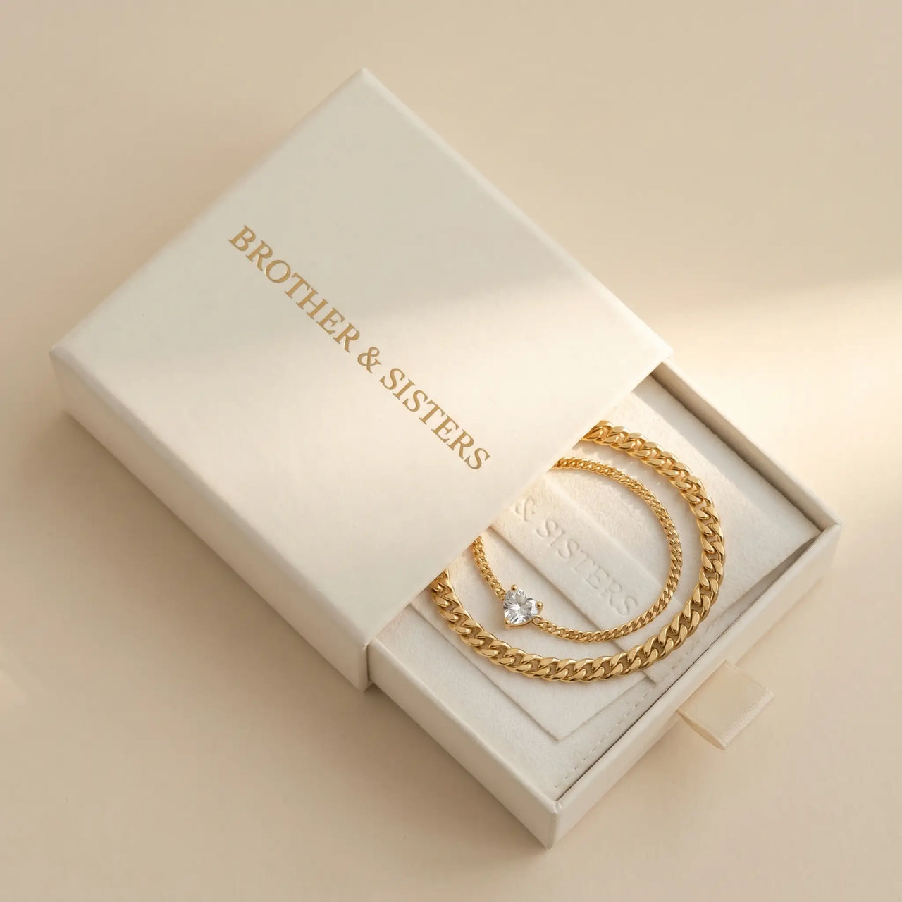 Brother and Sisters gift box with gold Heart Bond Matching Bracelet Set inside drawer
