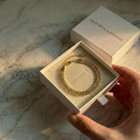 Thumbnail for Sifnos Woven Bracelet in a gift box by Brother & Sisters, showcasing its elegant woven design.
