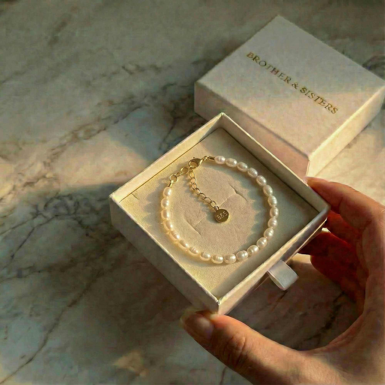 Freshwater Pearl Bracelet by Brother & Sisters in a gift box, featuring unique pearls and elegant design.