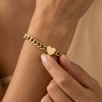 Thumbnail for Love Couple Bracelet featuring a polished heart on a bold Cuban link chain by Brother & Sisters.