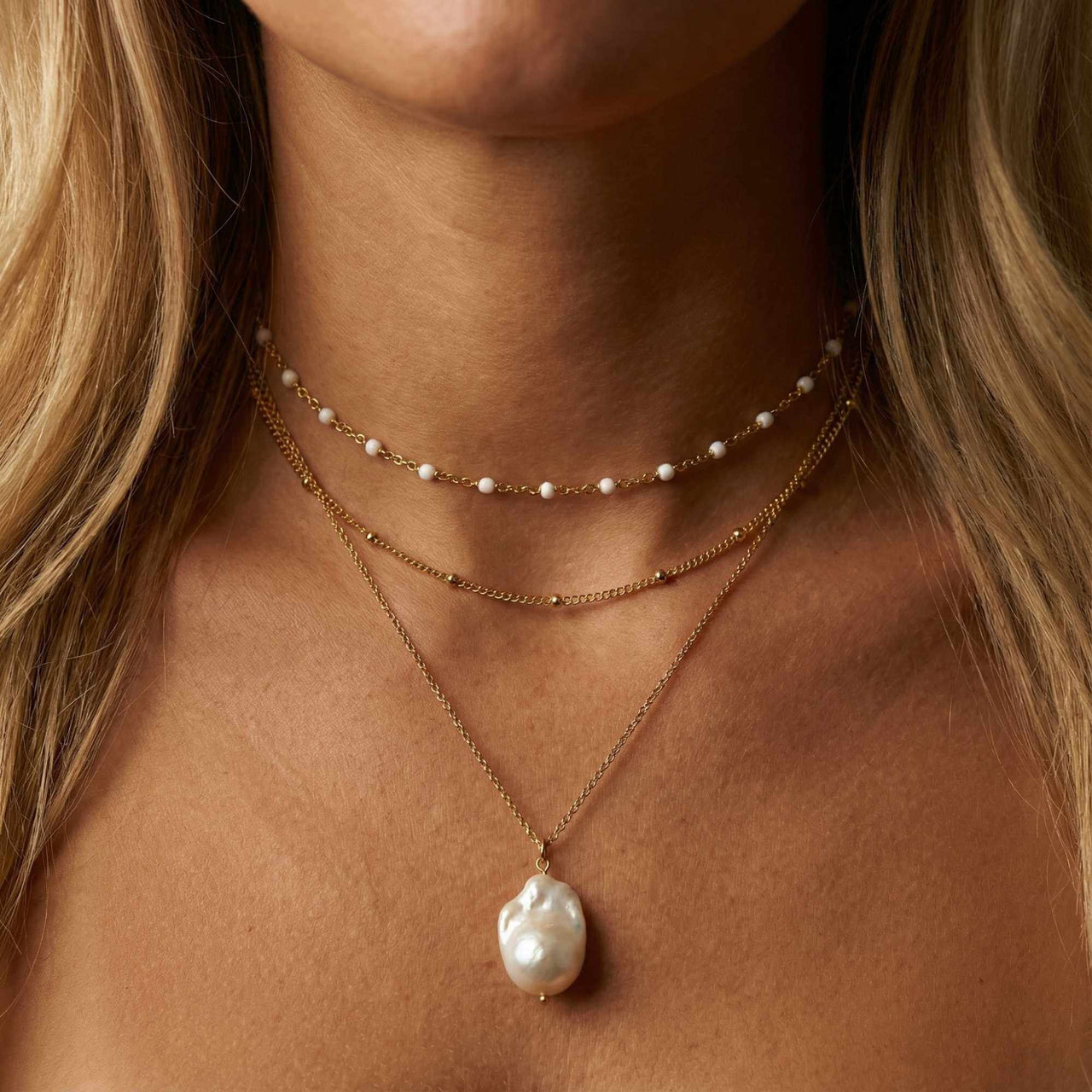 Double Layer Choker by Brother & Sisters featuring gold satellite and white enamel beaded chains, perfect layered elegance.
