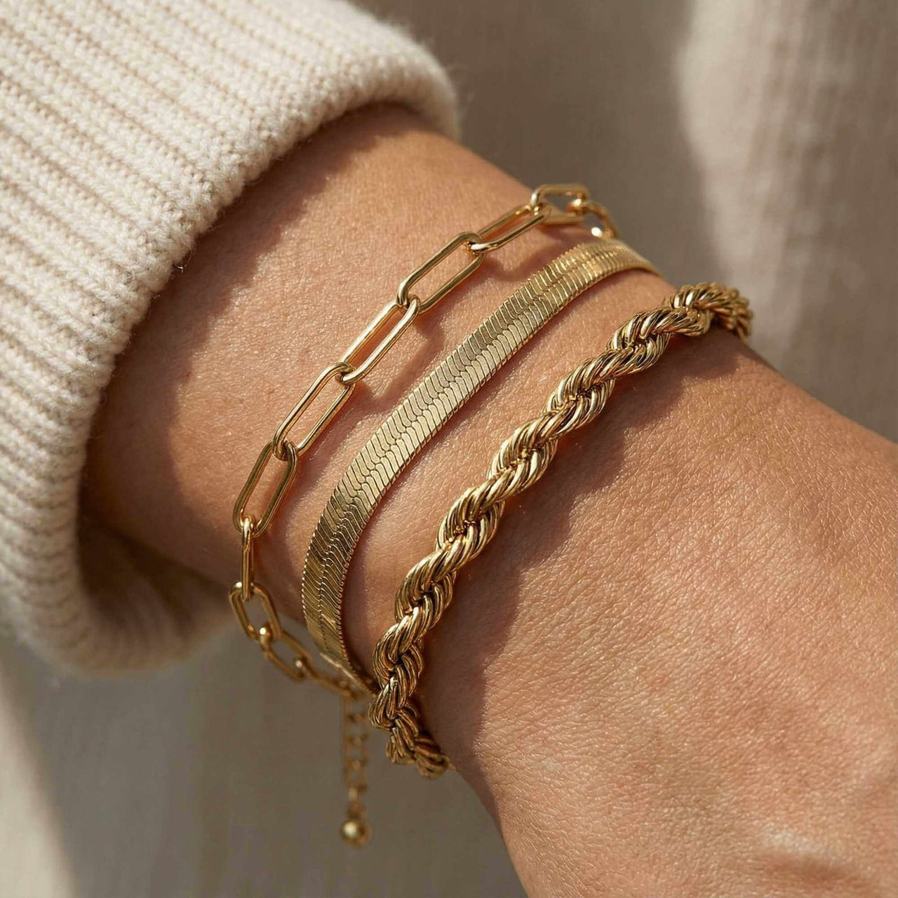 Freshwater Pearl Bracelet worn alongside elegant gold chains, highlighting unique handcrafted features by Brother & Sisters.