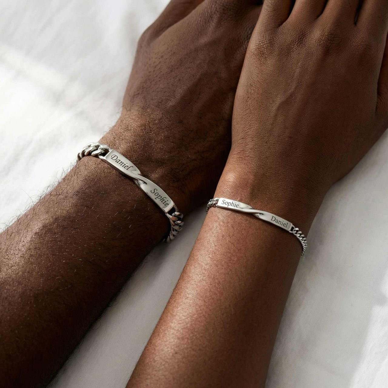 Infinity Bond Matching Bracelet featuring twisted bars with names Daniel and Sophie, by Brother & Sisters.