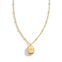 Thumbnail for Starlight Pendant Necklace by Brother & Sisters, gold tag pendant with zirconia stone, vintage medallion style.