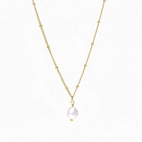 Thumbnail for Elegant Pearl Drop Necklace by Brother & Sisters featuring a baroque pearl on a textured satellite chain.