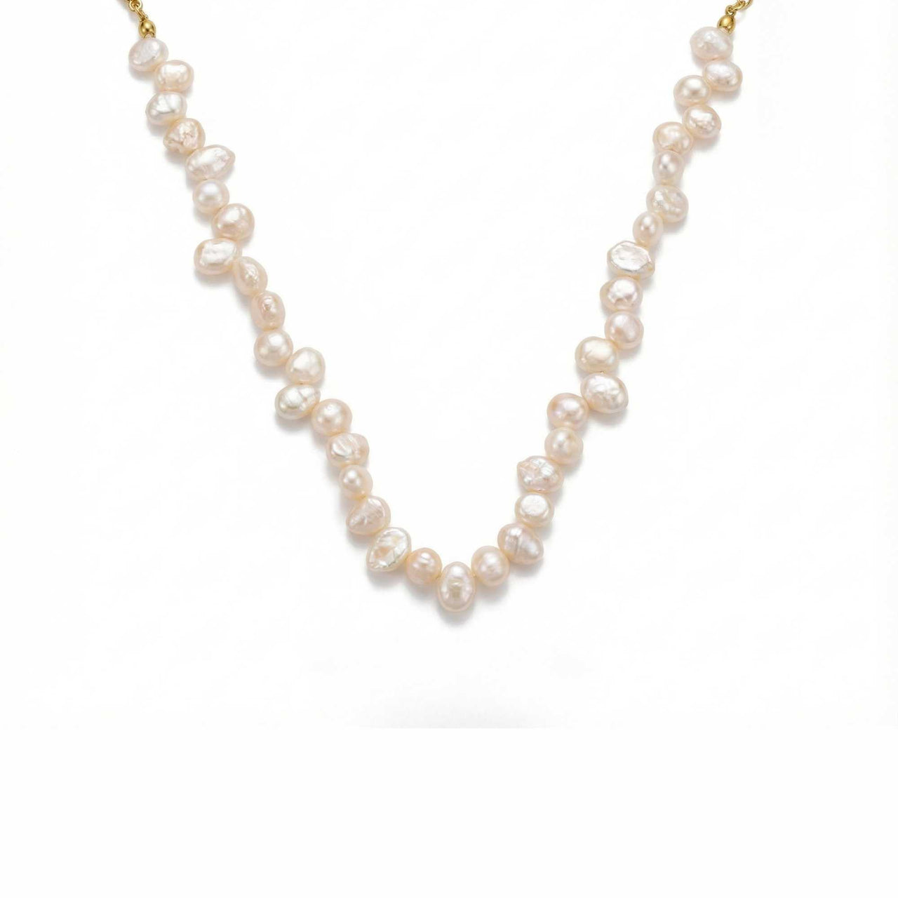 Sunseeker Pearl Choker featuring irregular baroque pearls on a golden chain by Brother & Sisters.