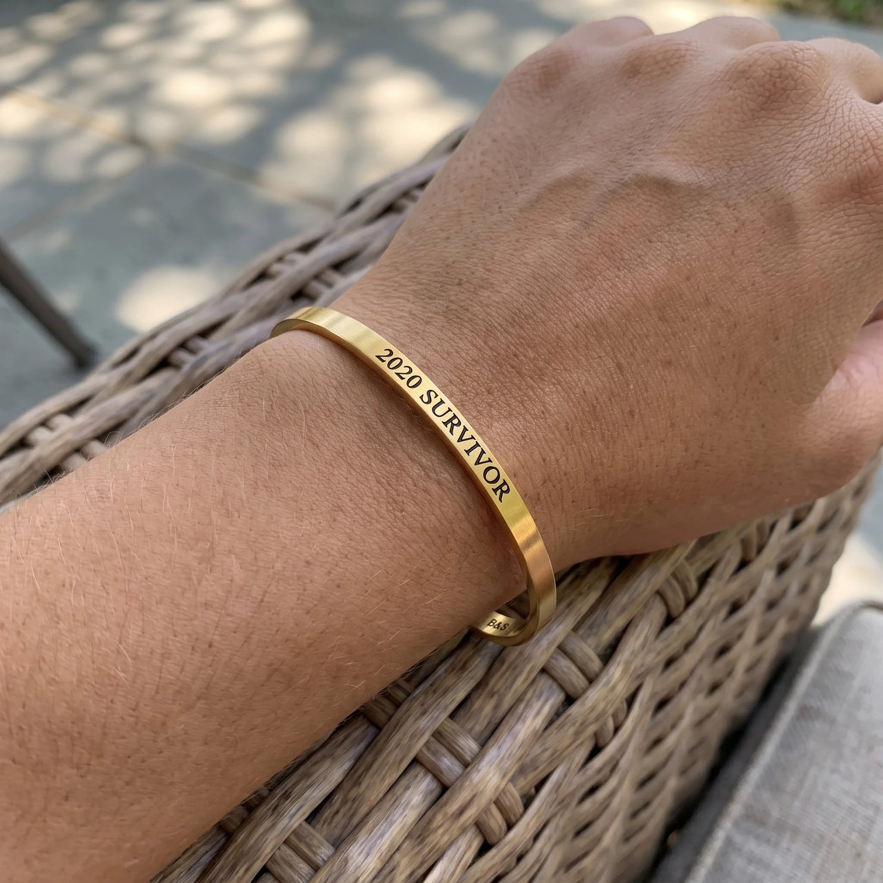 2020 Survivor bracelet in gold worn, showing its real size | SKU: 2020s-g
