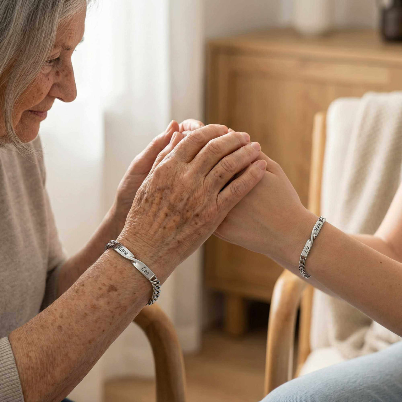 Infinity Bond Matching Bracelet worn by a woman and her mother, symbolizing love and connection by Brother & Sisters.