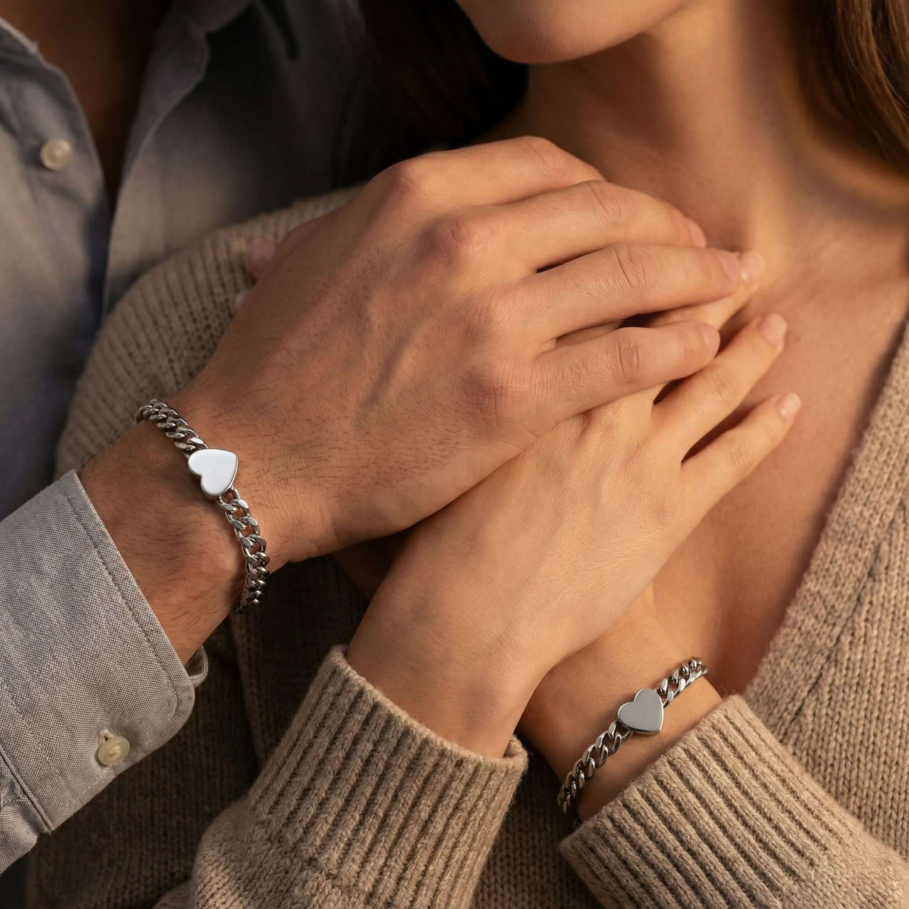 Love Couple Bracelet: matching heart bracelets by Brother & Sisters, featuring bold Cuban link chain and polished heart.