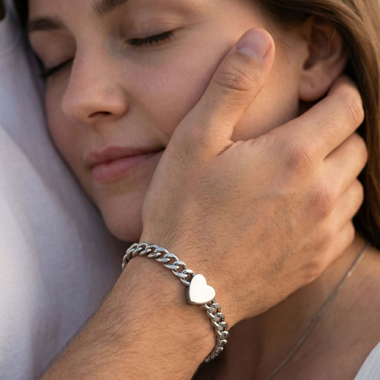 Love Couple Bracelet featuring a polished heart and Cuban link chain, symbolizing connection by Brother & Sisters.