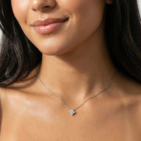 Thumbnail for Crystal Flower necklace worn by model — dainty four-leaf zircon flower pendant for refined everyday styling