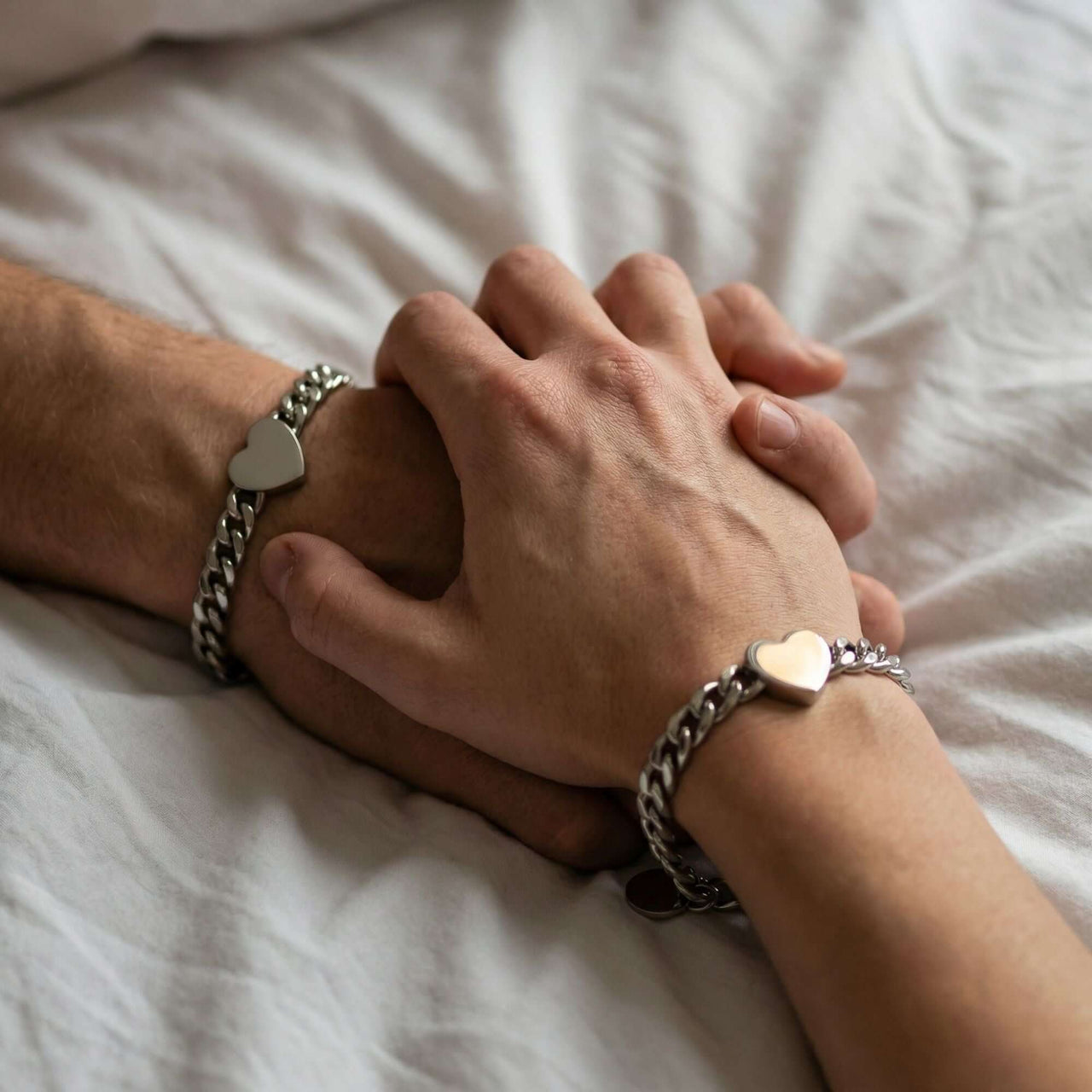 Love Couple Bracelet with polished heart and Cuban link chain, designed by Brother & Sisters for couples.