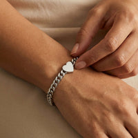 Thumbnail for Love Couple Bracelet featuring a polished heart on a Cuban link chain by Brother & Sisters.