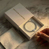 Thumbnail for Love Couple Bracelet by Brother & Sisters in a gift box, featuring a polished heart on a Cuban link chain.