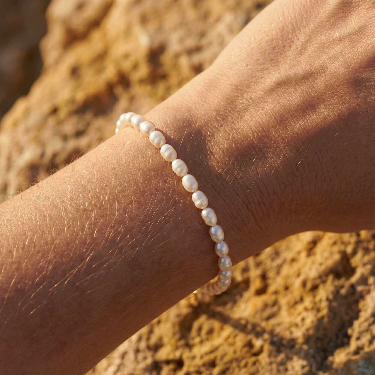 Freshwater Pearl Bracelet by Brother & Sisters, showcasing unique pearls on a wrist, capturing summer vibes.