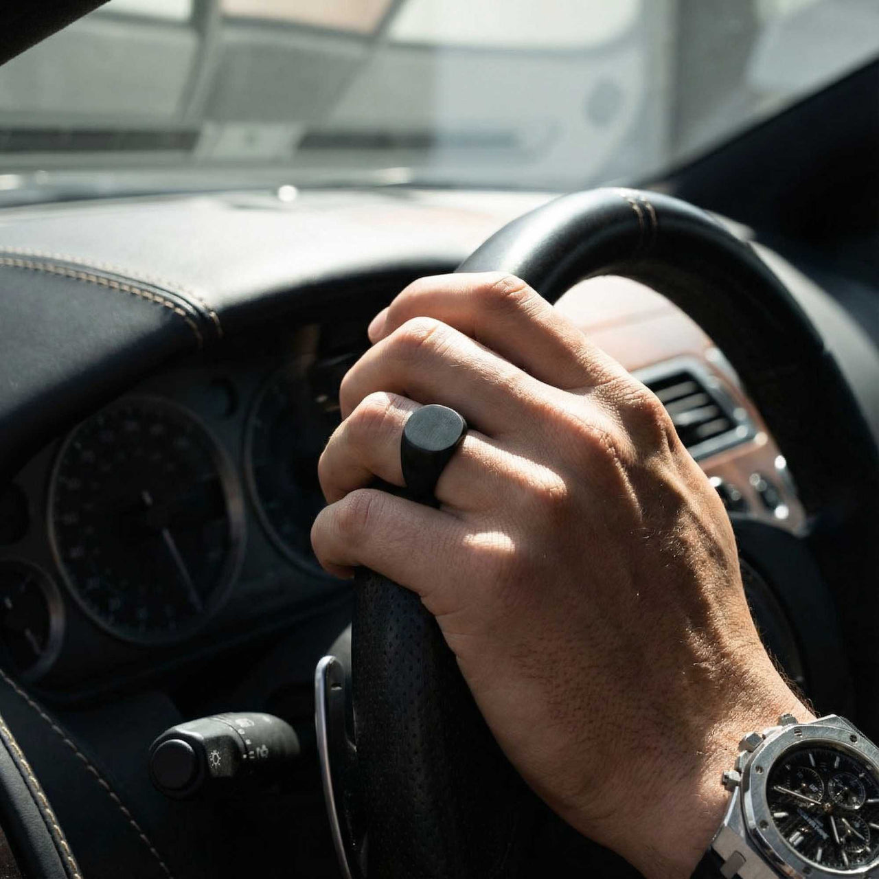 Oval Ring close-up packshot — black titanium steel wide band, hypoallergenic mens ring