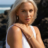Thumbnail for Freshwater Pearl Bracelet worn by a model, showcasing its unique pearls and beachy vibe. Handcrafted by Brother & Sisters.