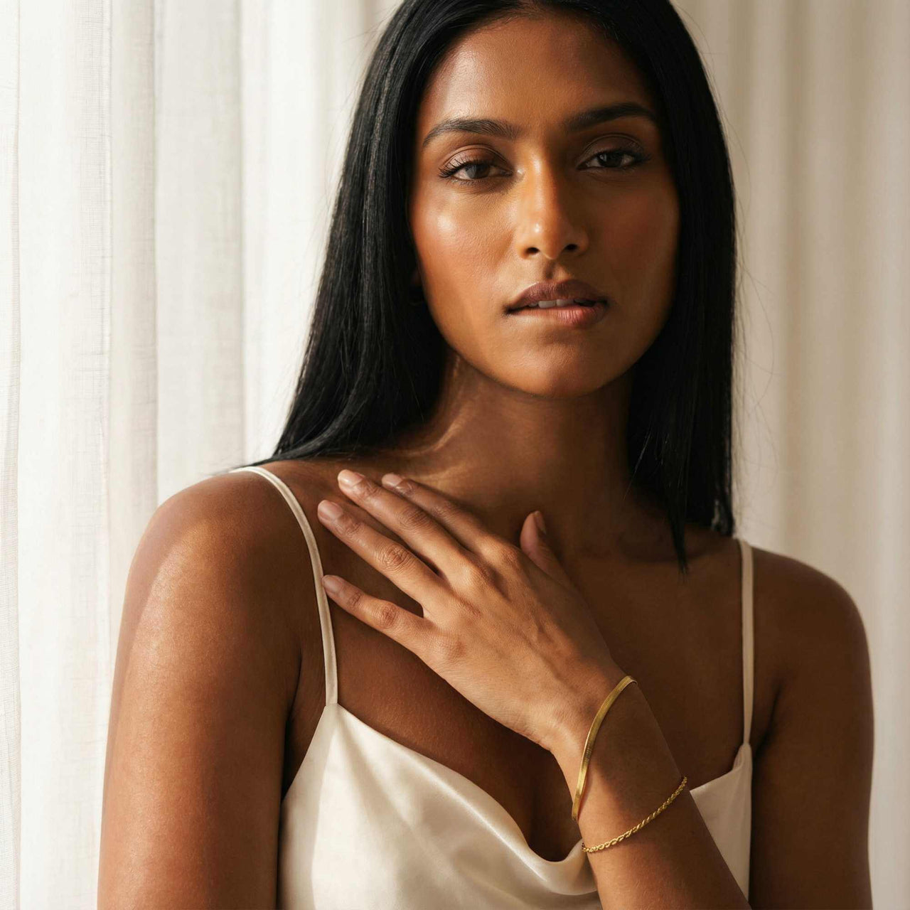 Ios Layered Bracelet worn by a model, showing its elegant design by Brother & Sisters.
