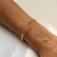 Thumbnail for Sifnos Woven Bracelet showcasing intricate gold mesh design on wrist by Brother & Sisters.