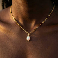 Thumbnail for Opal Pendant Necklace by Brother & Sisters featuring a AAA-grade opal set in gold on a delicate chain.