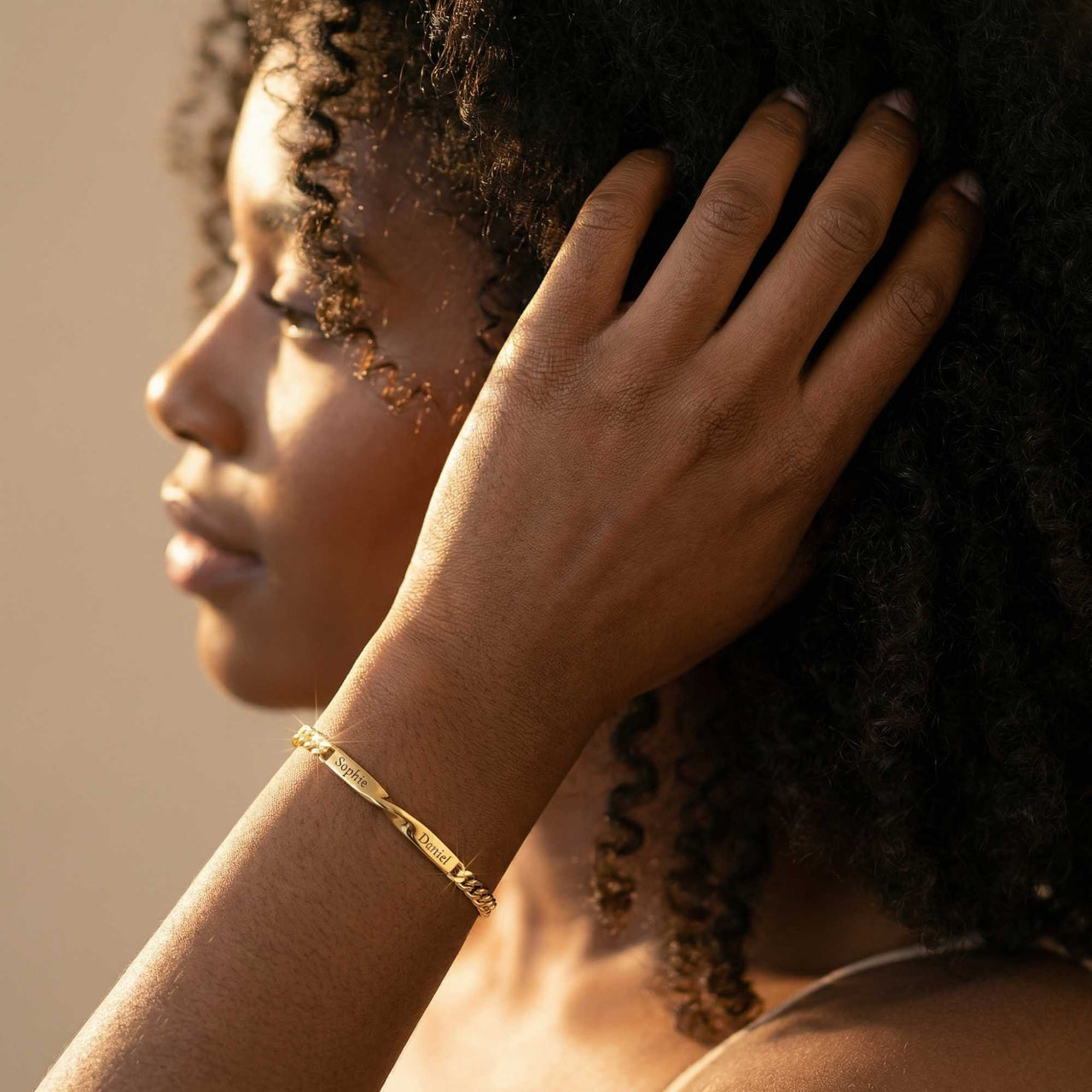 Infinity Bond Matching Bracelet showcased on a model, featuring intertwined names and elegant design by Brother & Sisters.
