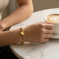 Thumbnail for Love Couple Bracelet by Brother & Sisters featuring a polished heart on a Cuban link chain.