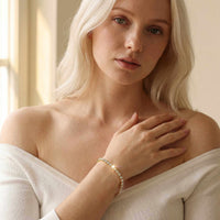 Thumbnail for Model wearing a Tennis Bracelet by Brother & Sisters, featuring sparkling zirconia in a stylish and elegant design.