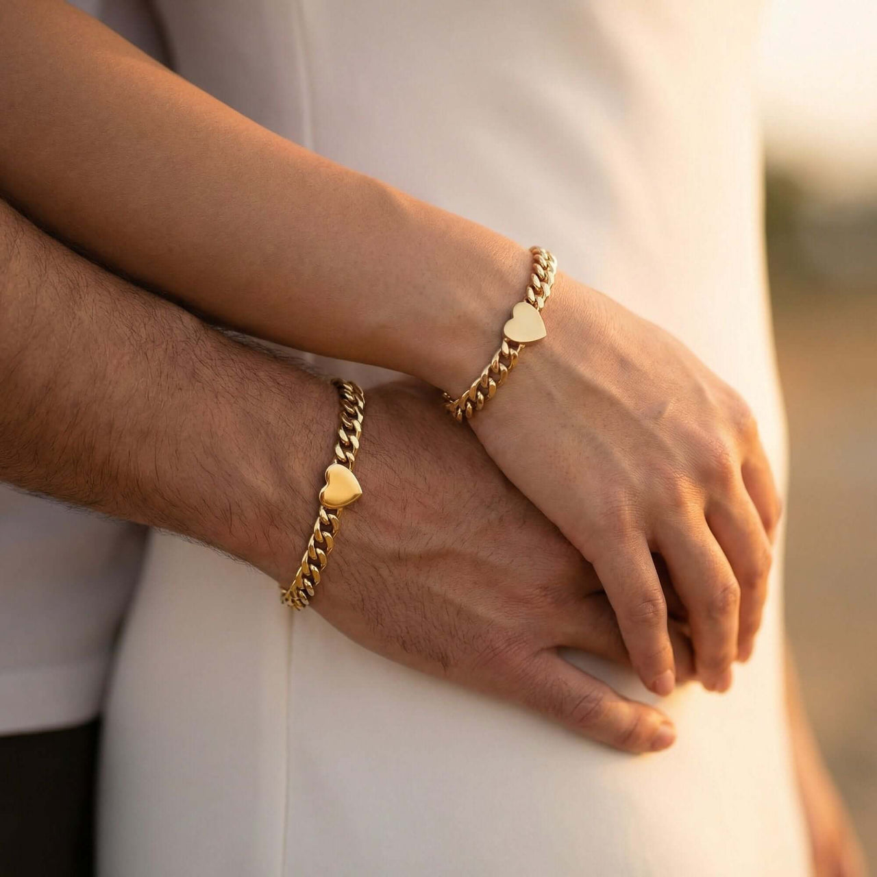 Love Couple Bracelet by Brother & Sisters, matching heart bracelets worn together on a romantic couple.