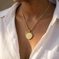 Thumbnail for Golden Sun Necklace worn by a model, featuring a textured sun medallion on a classic rope chain by Brother & Sisters.