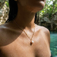 Thumbnail for Pearl Drop Necklace by Brother & Sisters, featuring an 8mm freshwater baroque pearl on a waterproof chain.