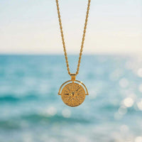 Thumbnail for Golden Sun Necklace by Brother & Sisters features a sun medallion on a rope chain, symbolizing positivity and vitality.