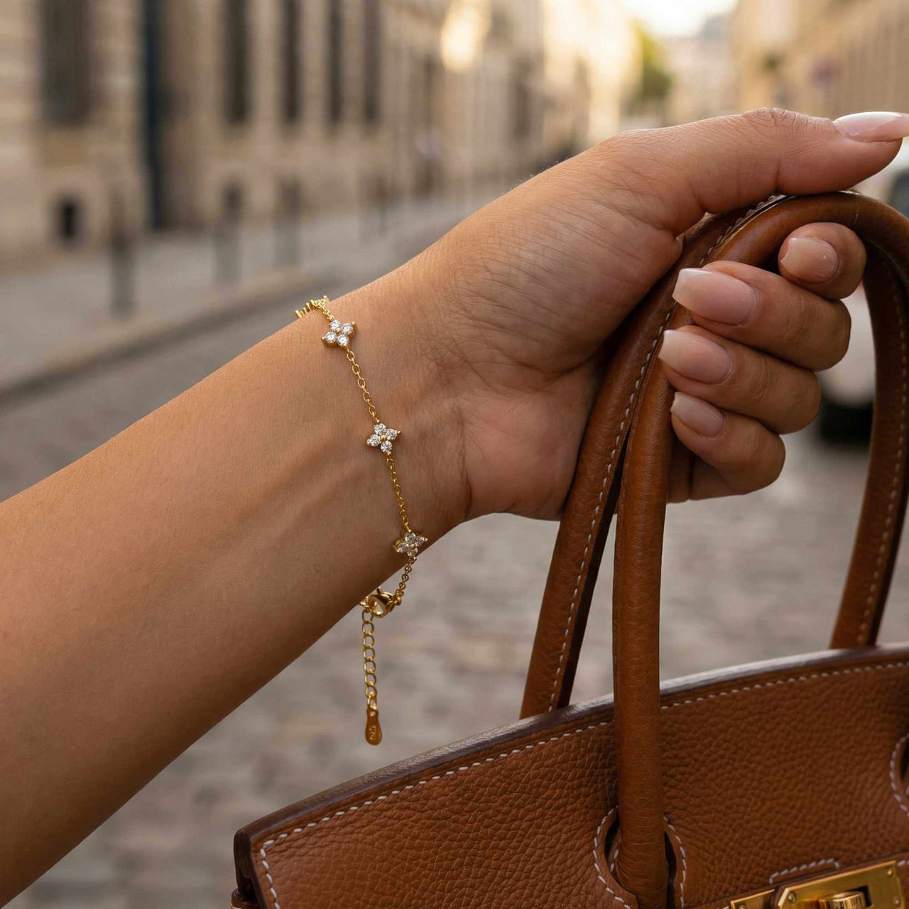 Crystal Flower Bracelet by Brother & Sisters featuring five crystal flowers on a delicate chain.