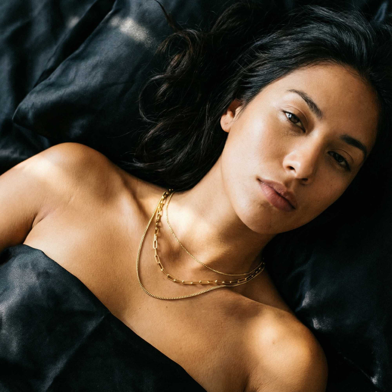 Saona Triple Layer Necklace by Brother & Sisters showcasing three gold chains of 36cm, 42cm, and 47cm lengths.