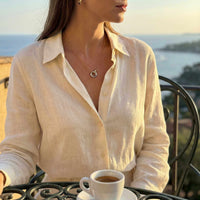 Thumbnail for The Unity Bond necklace by Brother & Sisters featured with warm gold bar and polished silver circle.