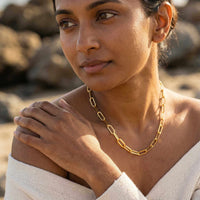 Thumbnail for Ria Paperclip Chain Necklace worn by a woman, showcasing bold oversized links and chic style by Brother & Sisters.