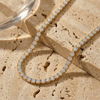 Thumbnail for Isolde Tennis Necklace features brilliant-cut diamond simulants in 18K gold, adding glamour to any outfit by Brother & Sisters.