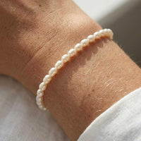 Thumbnail for Freshwater Pearl Bracelet showcasing unique handcrafted pearls by Brother & Sisters on a wrist.