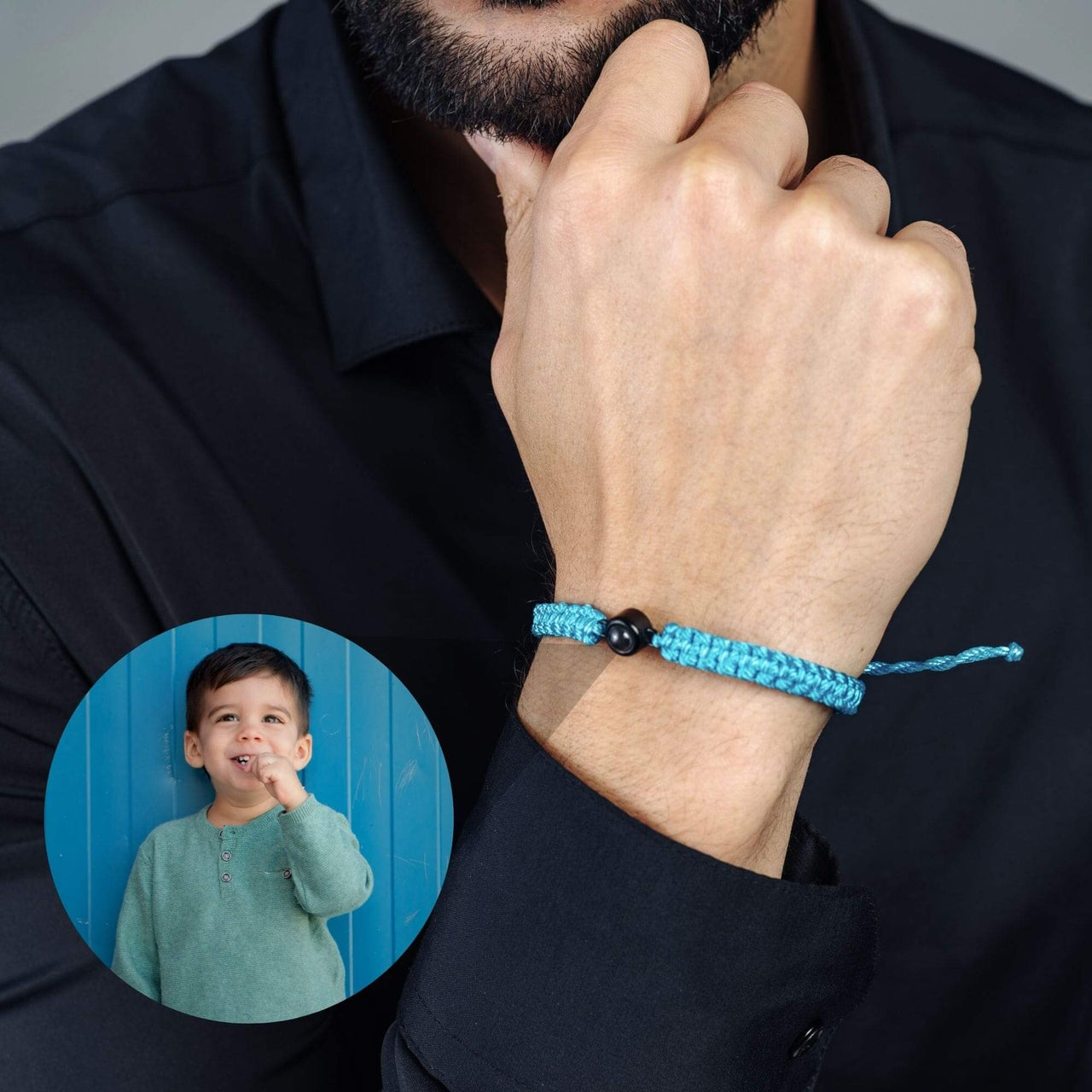Man Blue Photo Bracelet worn on a man's wrist, featuring a personalized photo of a child by Brother & Sisters.