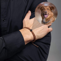 Thumbnail for Man Brown Photo Bracelet worn by a man, featuring a circle pendant with a photo of a dog, made by Brother & Sisters.