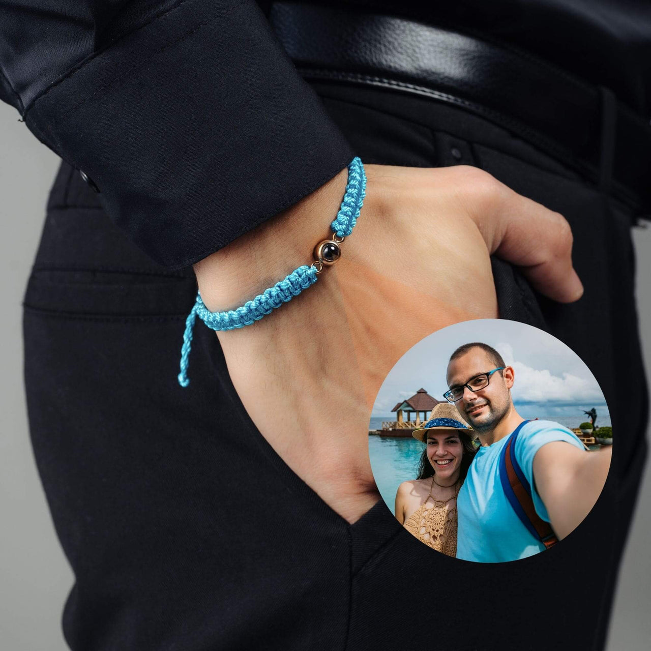 Man Blue Photo Bracelet worn on wrist, featuring a photo pendant, by Brother & Sisters, celebrating cherished memories.