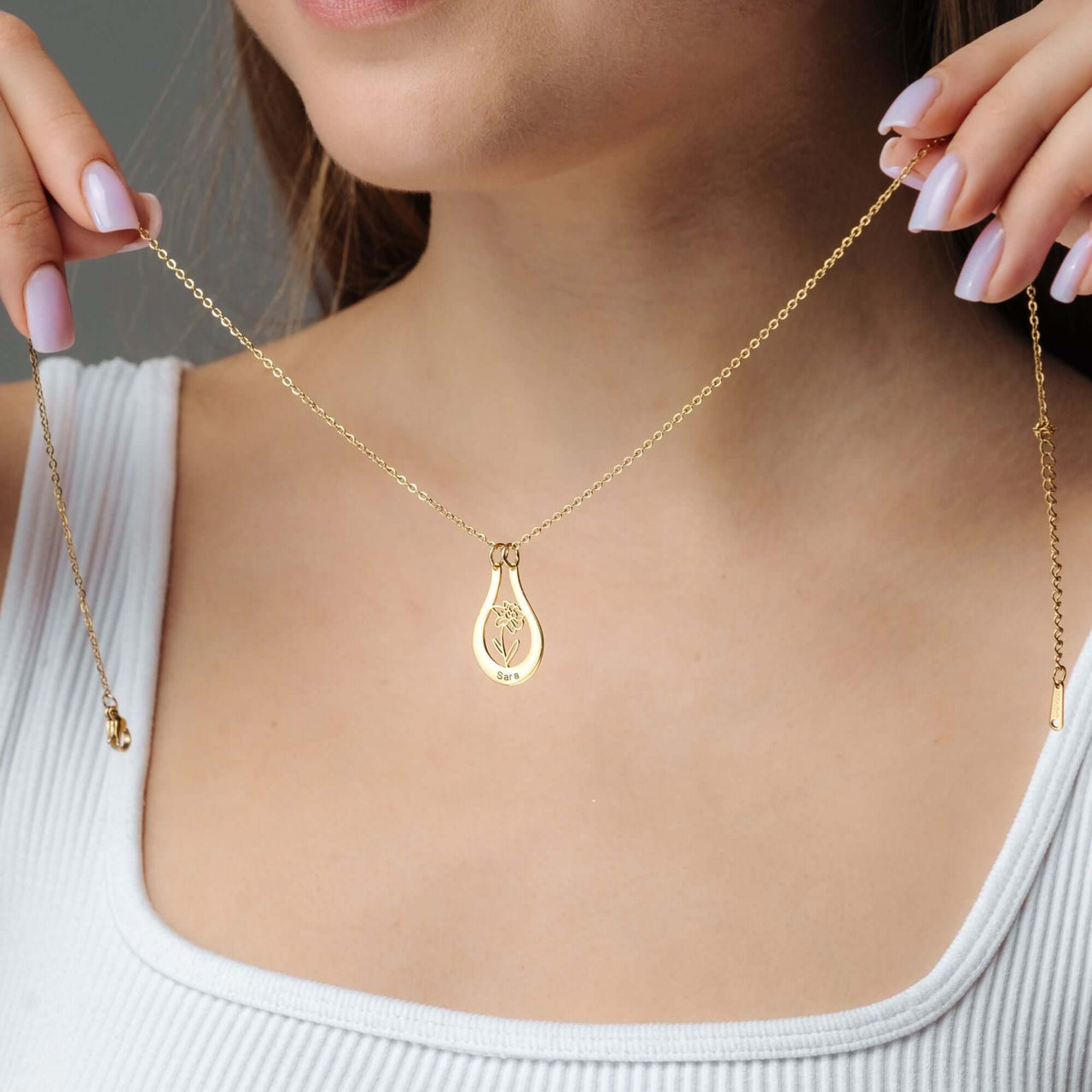 Birth Flower Name Necklace from Brother & Sisters, featuring a golden pendant with a birth flower design.