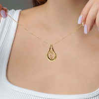 Thumbnail for Birth Flower Name Necklace by Brother & Sisters, featuring a golden pendant with a flower design, perfect for personal style.