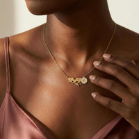 Thumbnail for Daisy Name Necklace by Brother & Sisters featuring three connected hearts and a delicate white enamel daisy.
