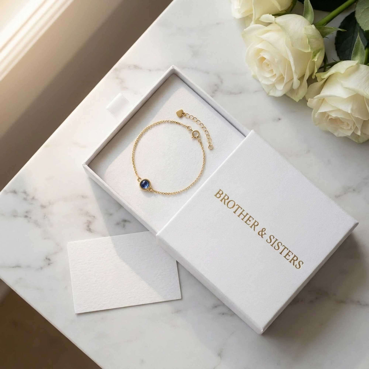 Photo Projection Bracelet in elegant box by Brother & Sisters, showcasing its delicate design and charm.