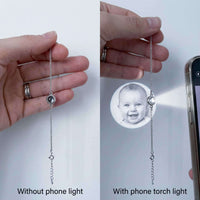 Thumbnail for Photo Projection Bracelet showing photo projection effects with and without phone light by Brother & Sisters.