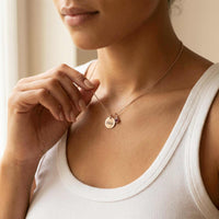 Thumbnail for Close-up of a woman wearing a Precious Name Necklace with the name 'Chloe' and a birthstone crystal by Brother & Sisters.